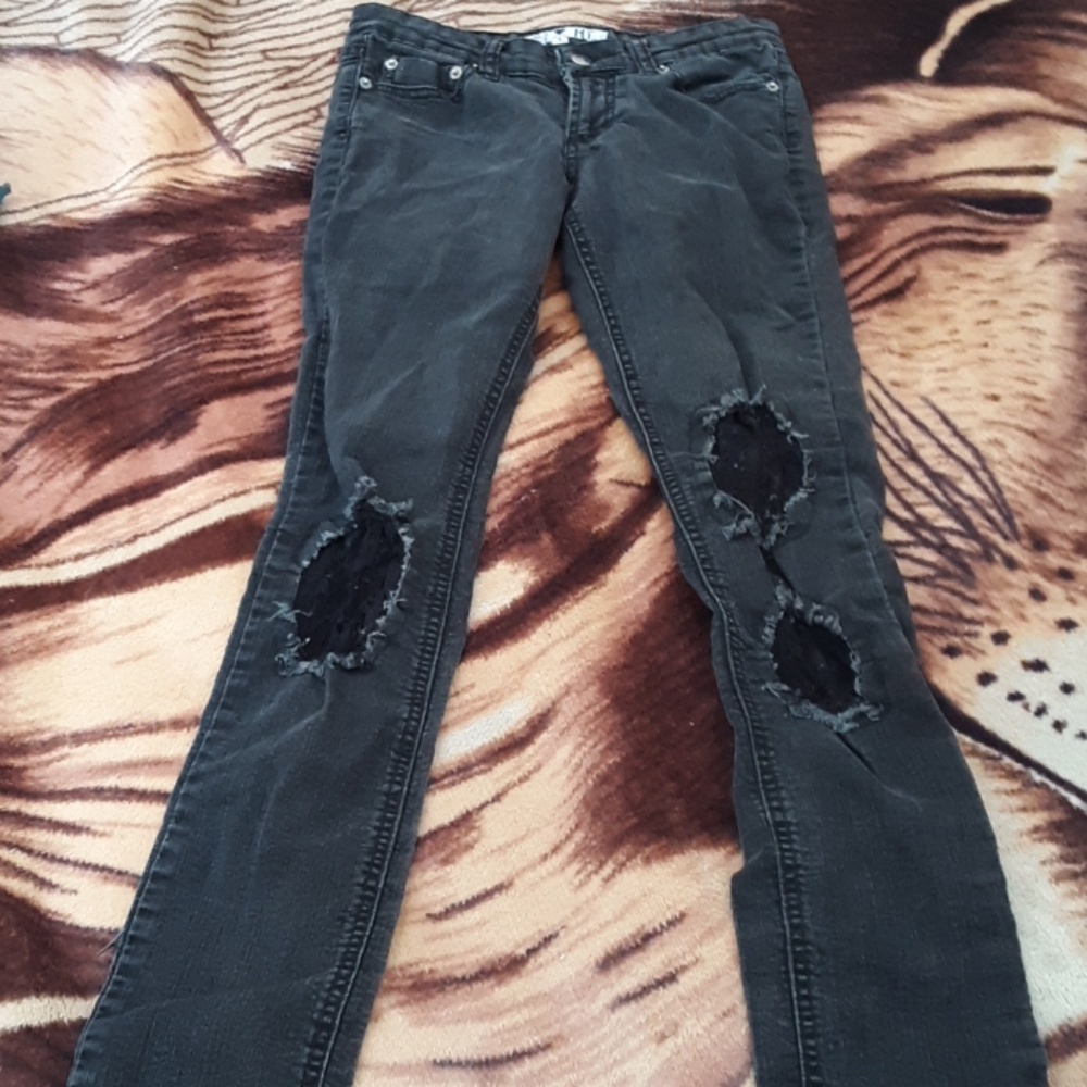 Jet black torn jeans